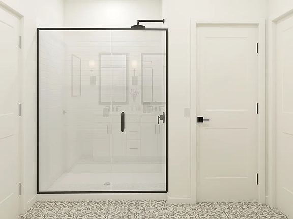 Primary bath with glass shower enclosure