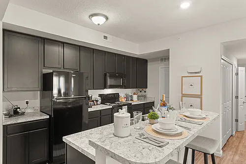 The Residences at Golf Village Photo 1