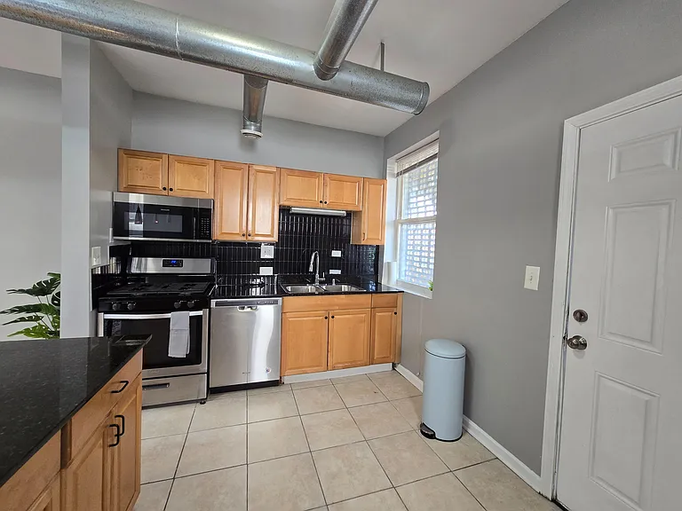 E 65th Pl — Photo 8