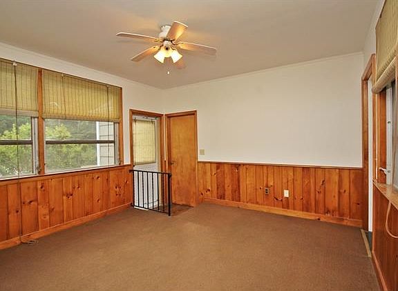 Enjoy this wonderful three season room which overlooks private yard.  Spacious, sun filled breezeway leads to kitchen, garage, front & back yards.