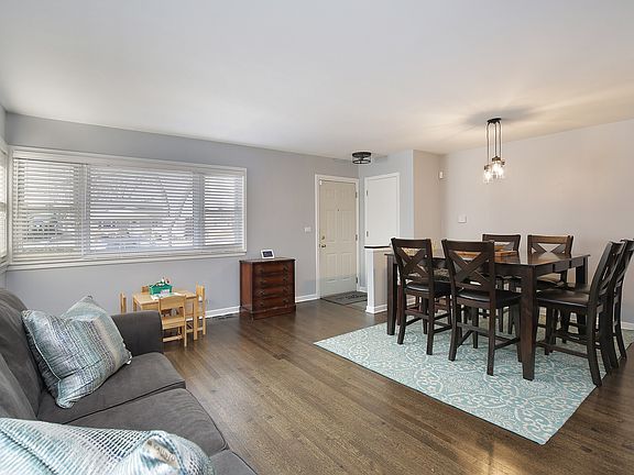 Living room/Dining Room w/refinished floors.