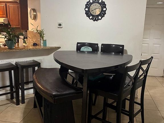 5th image of 8761 Wiles Rd APT 206