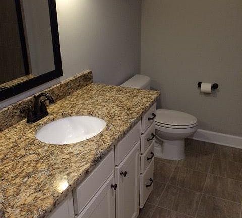 Bathroom / Walk in tiled shower with glass door not shown