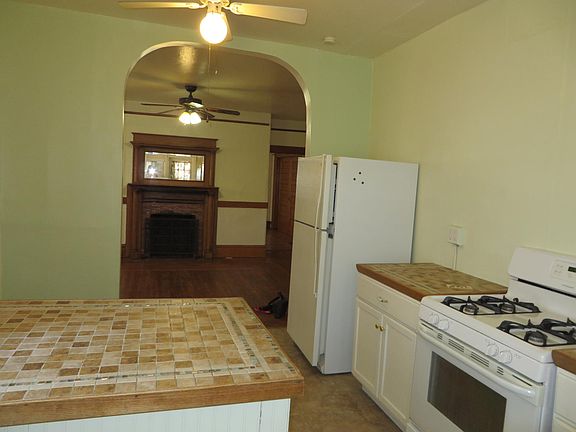 View of the kitchen looking into the living room