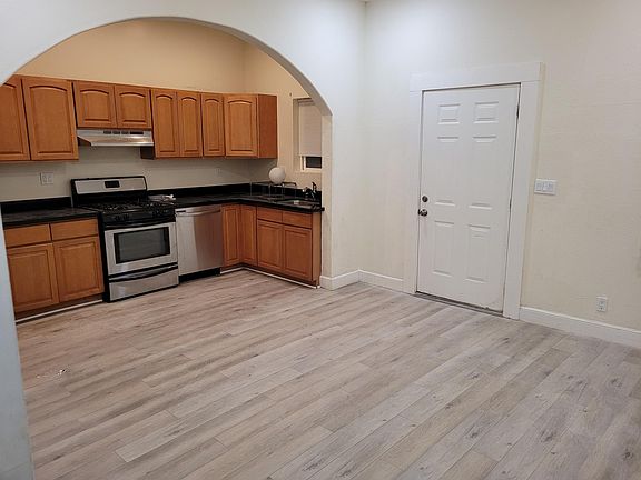 Kitchen in back of unit.