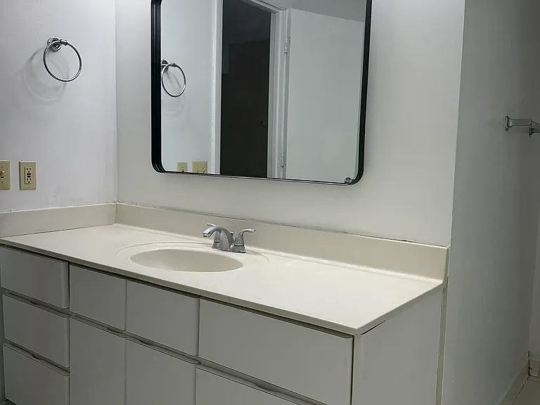 Bathroom 1. great lighting. just off of the main room, close to main entry.