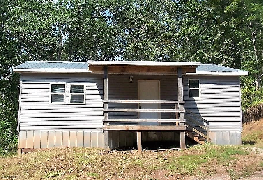 This 2016 built cottage feels bigger inside due to an open floor plan.  The house is move in ready..the landscaping will be up to the new owners.....