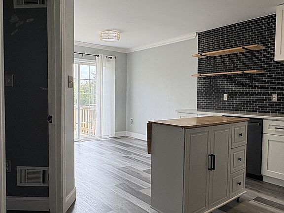 Kitchen & Entrance to Main Floor Bedroom