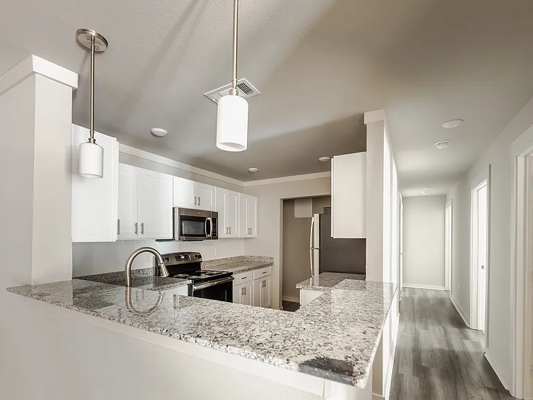 The Sanderling. A three bedroom, two bath apartment home located on the ground and second floor.