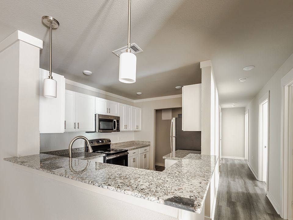 The Sanderling. A three bedroom, two bath apartment home located on the ground and second floor.