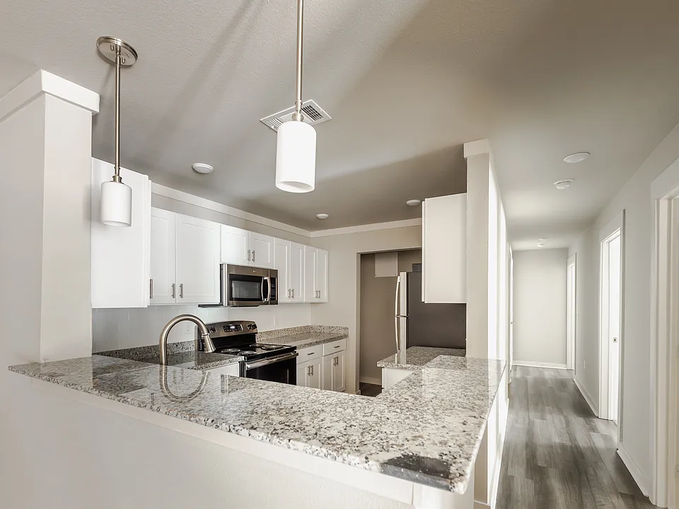The Sanderling. A three bedroom, two bath apartment home located on the ground and second floor.