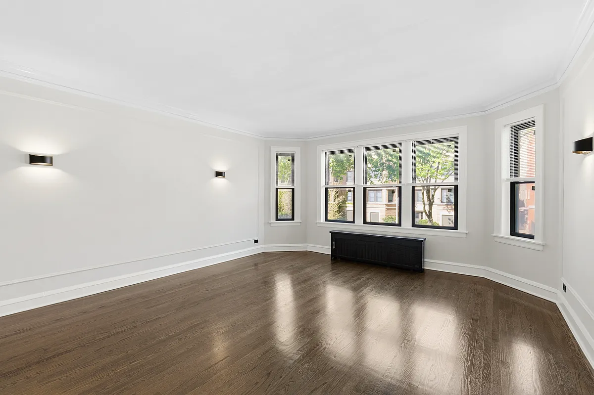 Building Photo - 6851 S Paxton Ave #1N