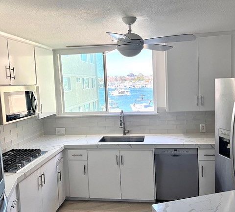 New Kitchen with Quartz counters and Bay View