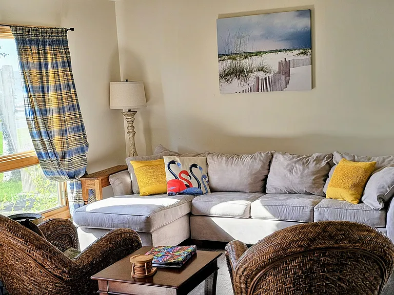 Sunlit living room overlooking Saratoga lake and lower Adirondack mountains.