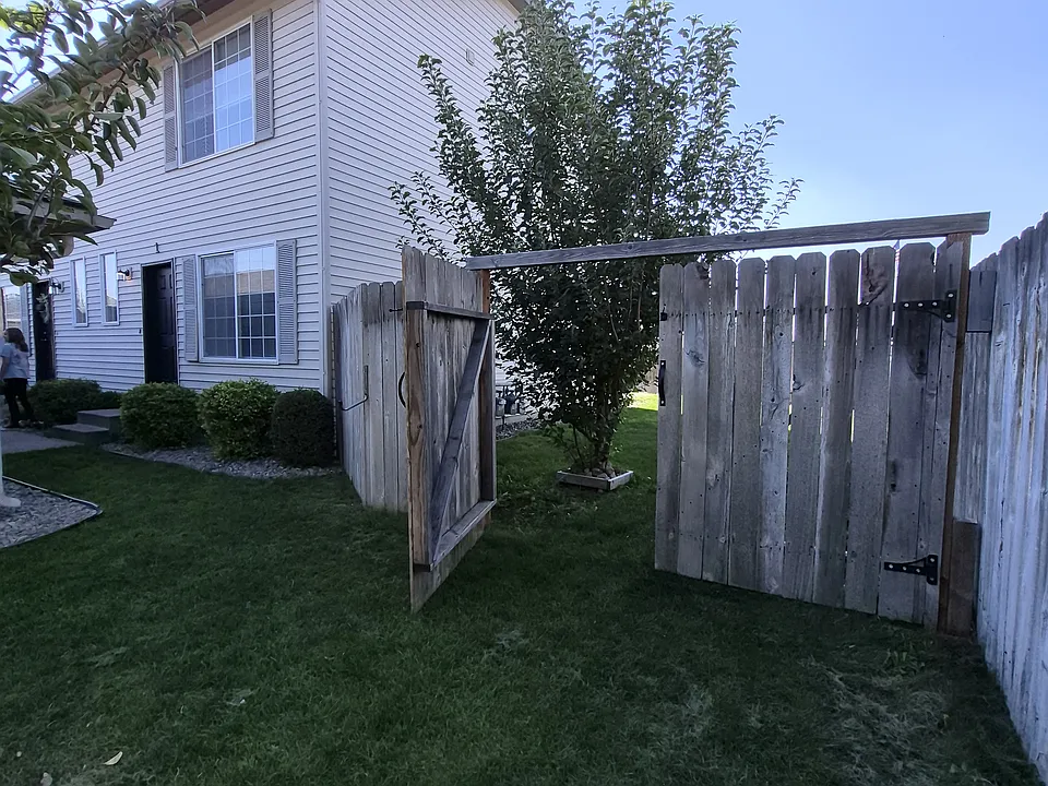 Private Fenced yard with fruit trees and garden space
