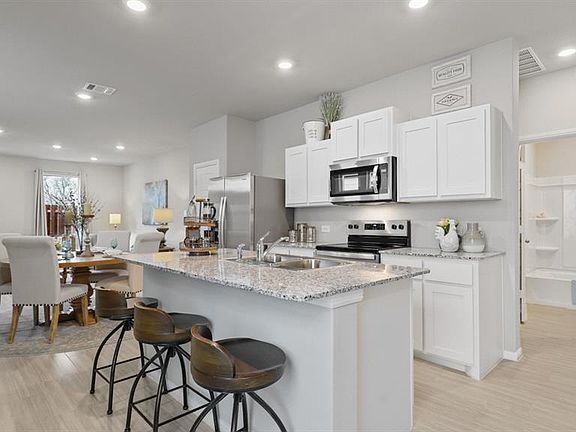 Kitchen - All Home and community information, including pricing, included features, terms, availability and amenities, are subject to change at any time without notice or obligation. All Drawings, pictures, photographs, video, square footages, floor plans, elevations, features, colors and sizes are approximate for illustration purposes only and will vary from the homes as built.