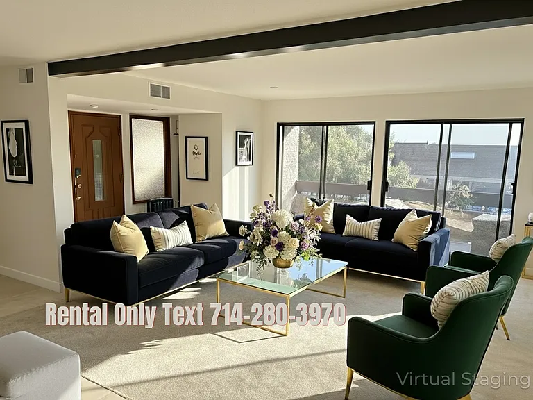 Enhanced photo of 30242 Via Borica. Living room on second floor with ocean view through rooftops across the street