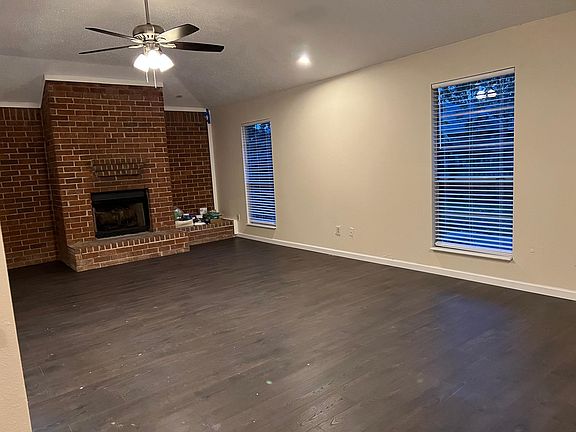 Spacious living area with fireplace!