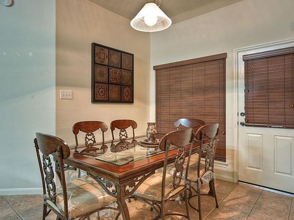 Breakfast area is perfect size. Door leads to back yard.
