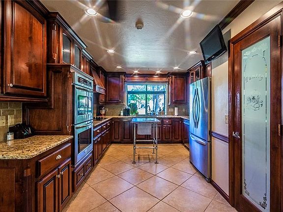 Kitchen provides abundant storage with large pantry and gourmet experience for any chef