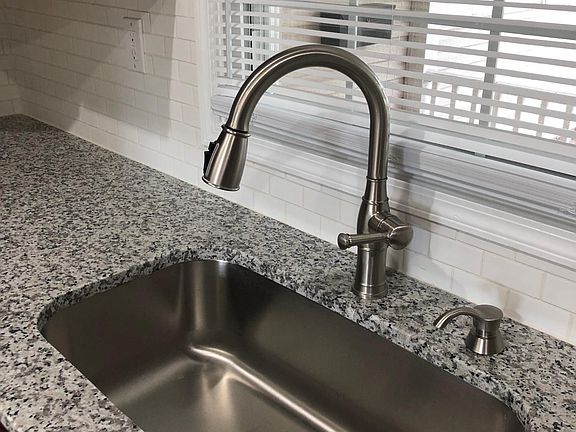 Over Sized Stainless Sink & New Granite Countertops