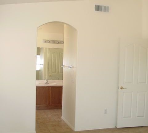 bedroom looking into master bath