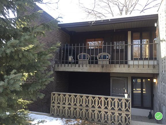 Upper unit with the largest patio in the complex. Includes BBQ.