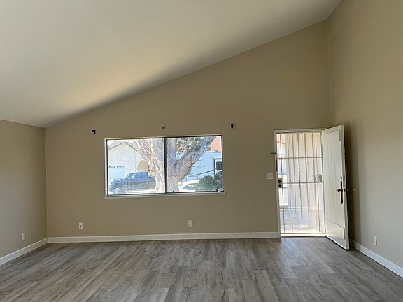 Living Room - Front Entry & High Vaulted Ceiling