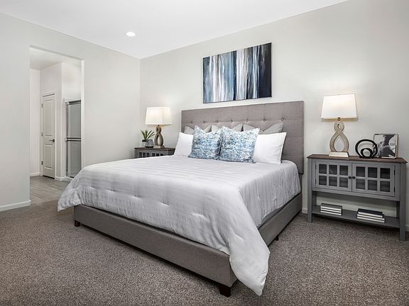 Retreat to your downstairs primary suite.
