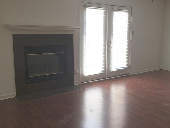 living room with gas log fireplace