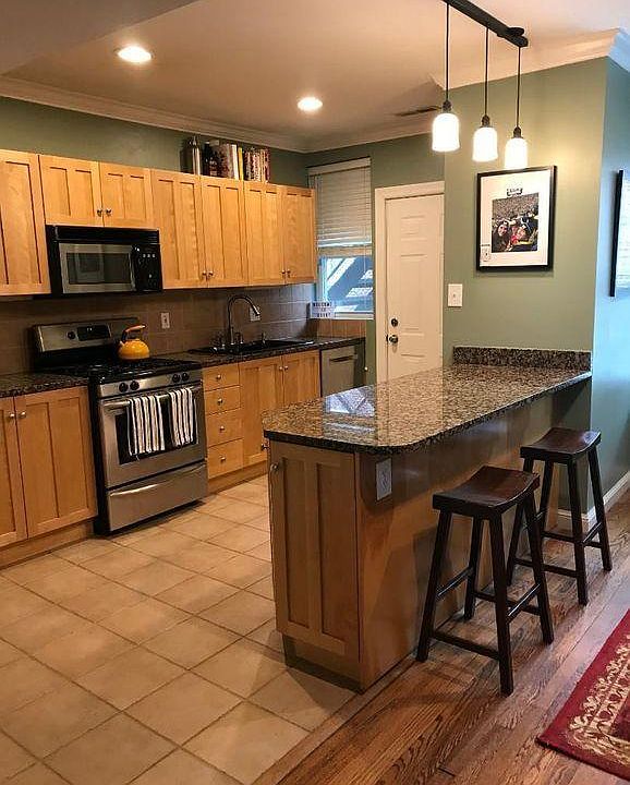 Updated kitchen with granite & stainless appliances