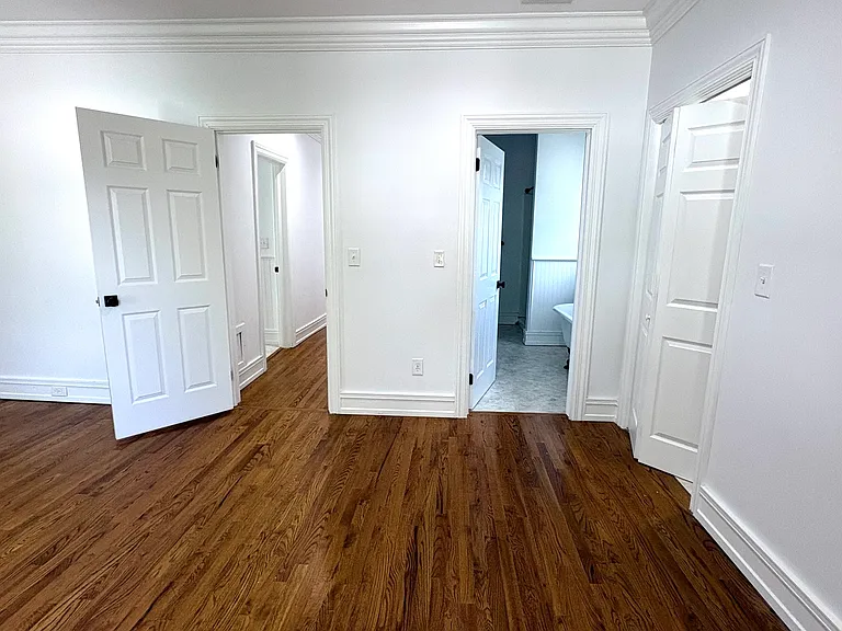 2nd Fl - EnSuite Primary Bedroom with Primary Bath (r) and Hallway (l)