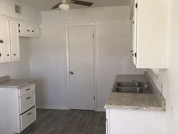 bright kitchen with pantry 