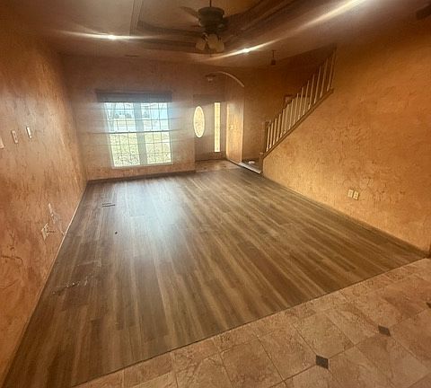 Living Room looking towards front door from dining area.
