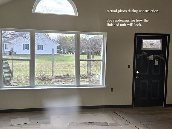 Actual photo during construction. See renderings for how the finished unit will look