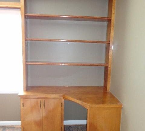 built in bookcase and desk