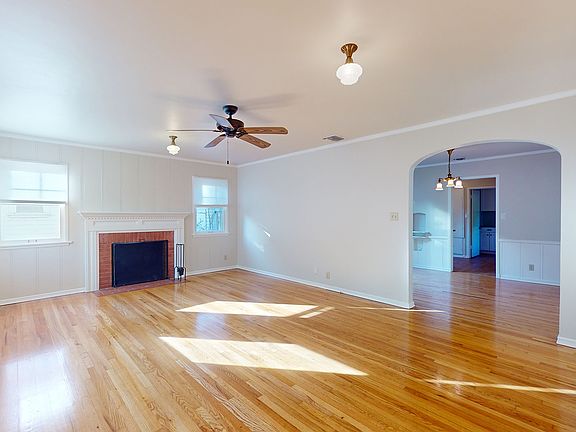 Living Room, view into Dining room with Kitchen beyond