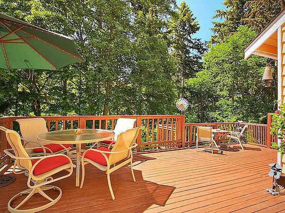 Overlooking Fauntleroy Park. Soft breezes in fir trees and songbirds.