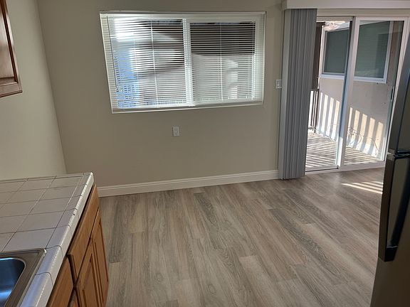 New dual pane sliding door from living room to balcony.