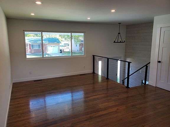 Main level living room with hardwood floors.