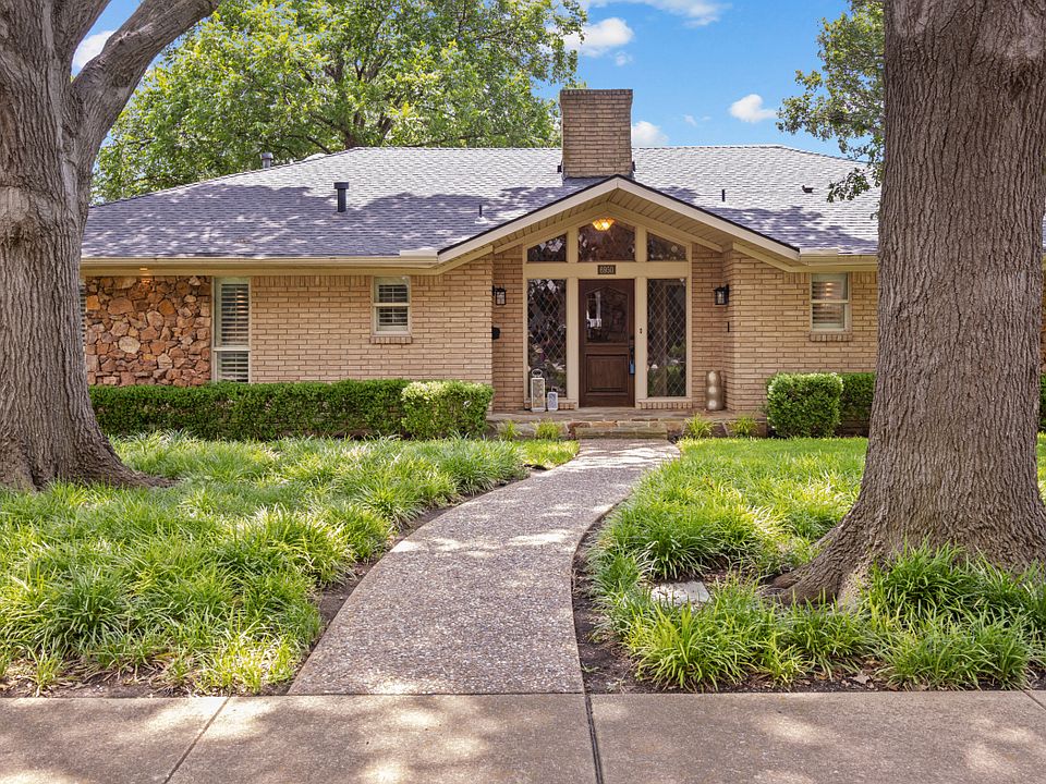 Wonderful curb appeal - mature trees.