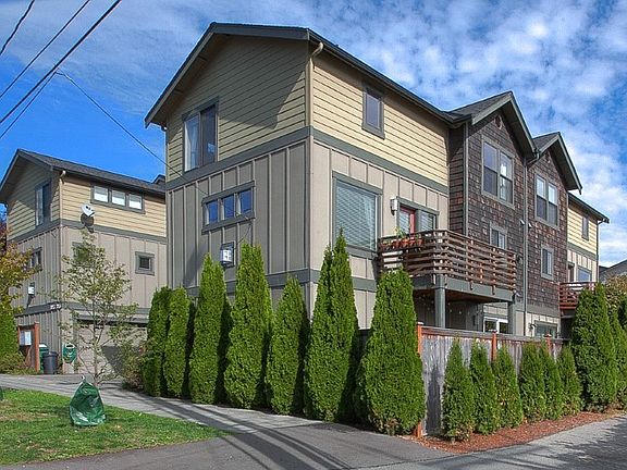 Gorgeous Ballard townhome with oversized rooms and open floor plan! Enjoy the convenience of stepping out your front door & walking to all amenities & activities. Stunning Brazilian Cherry hardwood floors, unique stainless steel kitchen island, ample storage & custom finishes throughout make this an impressive place to call home. Large windows provide tons of natural light, fenced yard w/ custom patio, generous deck & beautiful 5 piece bathroom. Many bus lines available & short commute downtown.