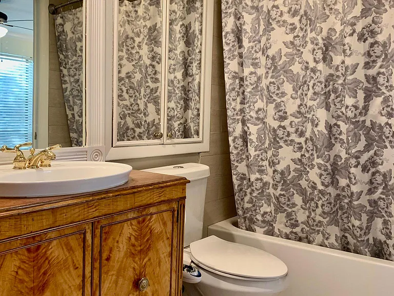 Bath off of first bedroom also has entrance from foyer