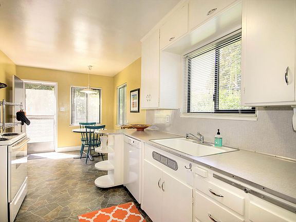 Kitchen - opens to patio + yard
