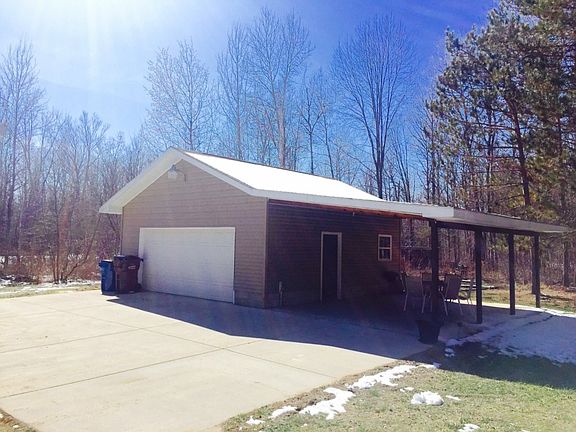 The garage is 24x24 with a huge covered patio that is perfect for grilling out and gatherings.
