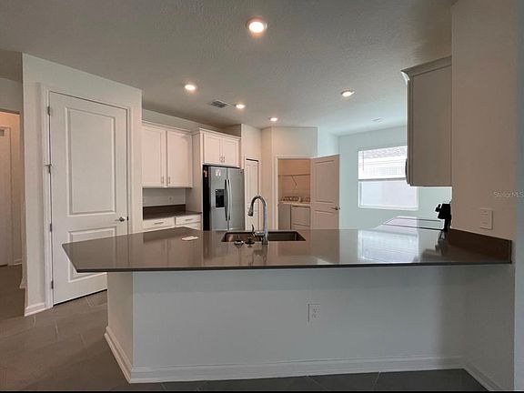 3rd image of 6967 Church Lake St #1