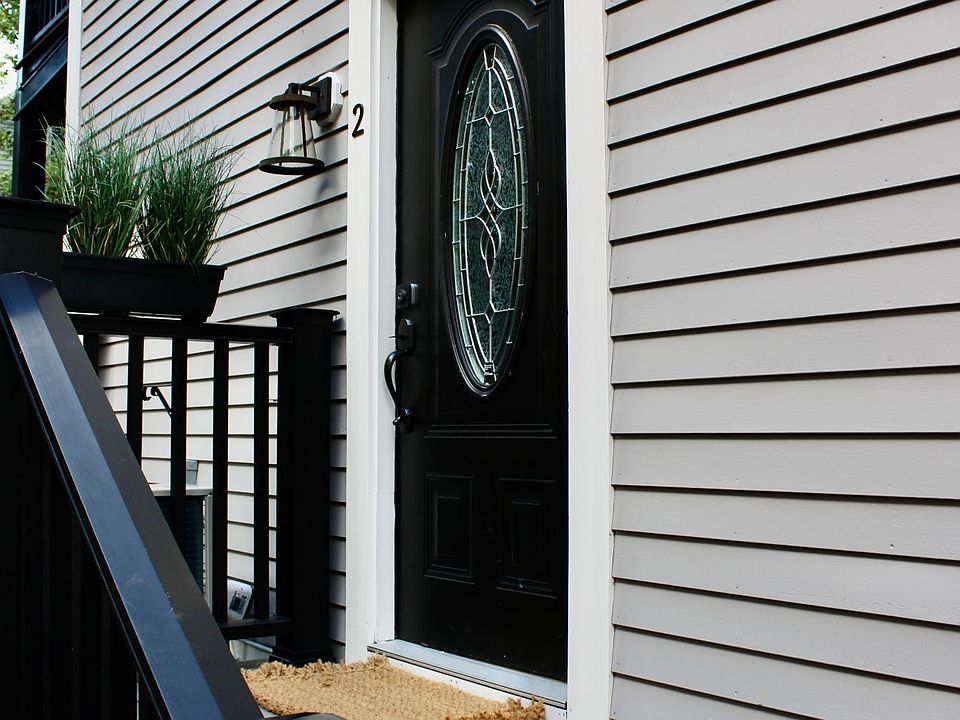 Unit 2 entry on left side of building