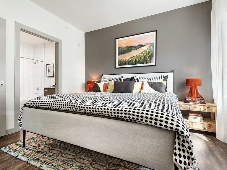 Spacious Second Bedroom with Wood Floors and Ensuite Bath