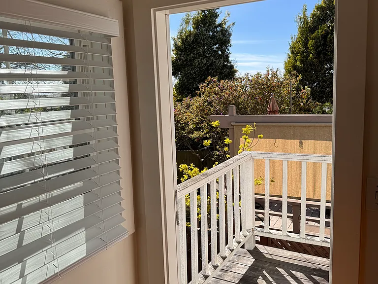 Sunny, small deck off the office.