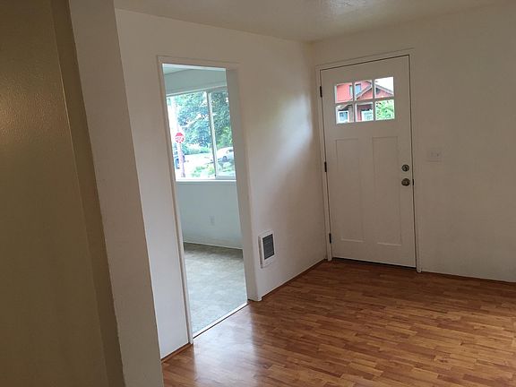 Looking at front Door/ Entry to Kitchen
